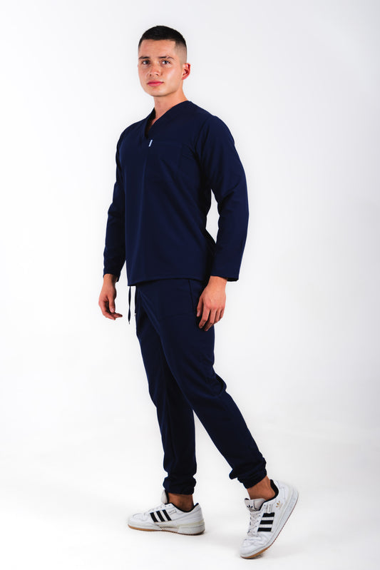 Uniforme quirúrgico para caballero color azul marino, manga larga corte jogger. modelo winter marca addisonscrubs.