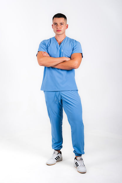 Uniforme quirúrgico para caballero color azul francia corte jogger. modelo jener marca addisonscrubs.